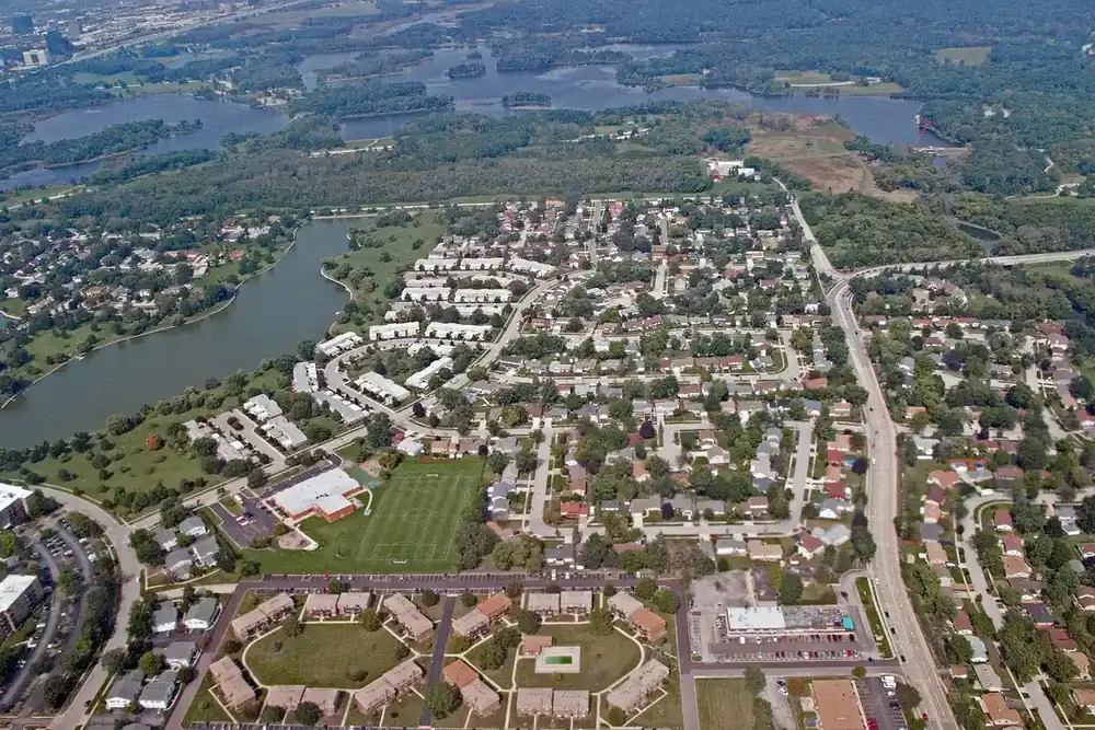 Aerial view of homes, a lake and parkland in Elk Grove Village, Illinois
