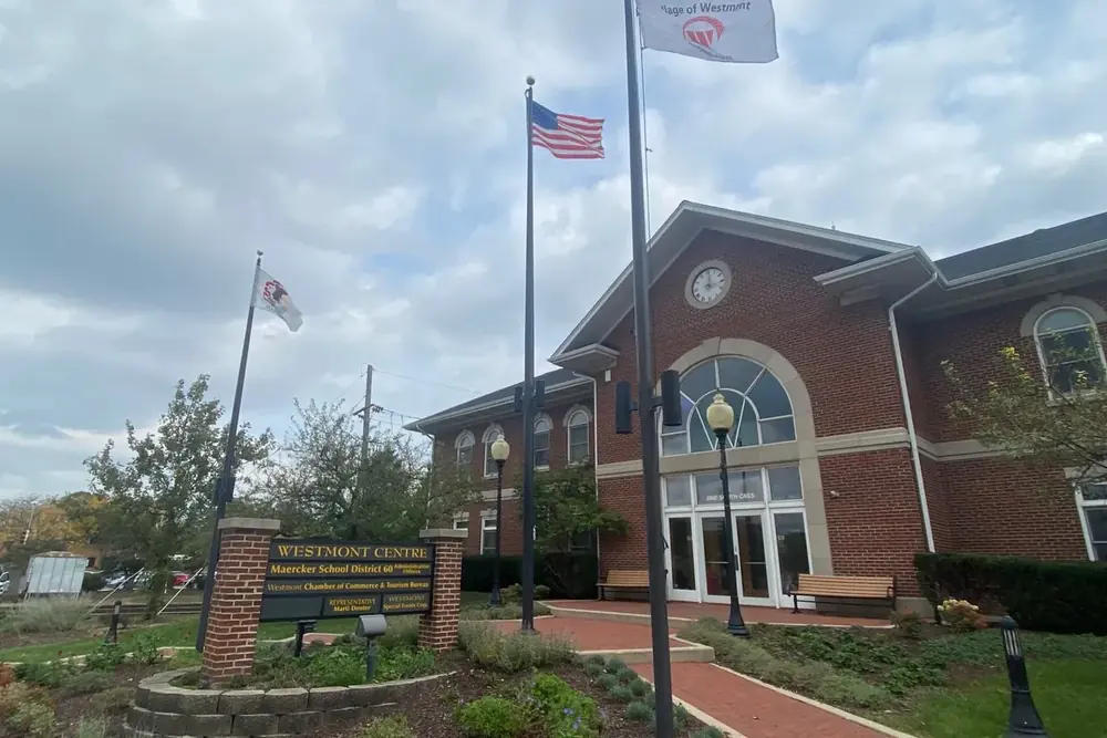 Brick Westmont Centre with flagpoles and a landscaped entry walk, Illinois